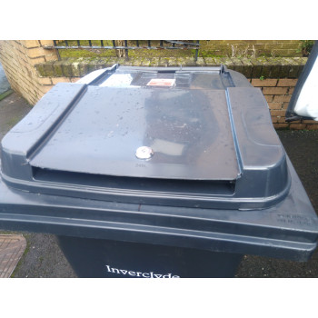 Universal  Lid Lock.  Fits all shapes of lid.